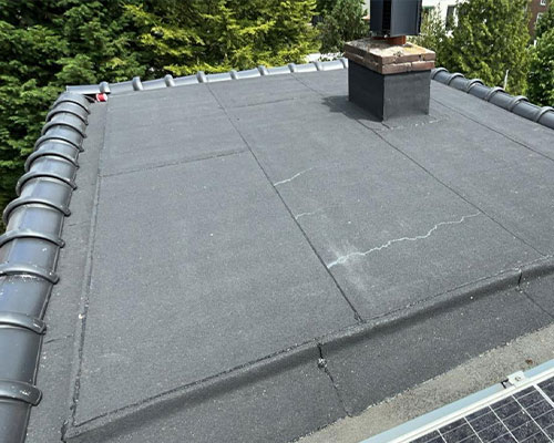 Plat dak reparatie